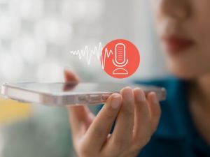 Person using voice recording app on smartphone, symbolizing screen readers and AI accessibility tools that help make content accessible translation office Berlin