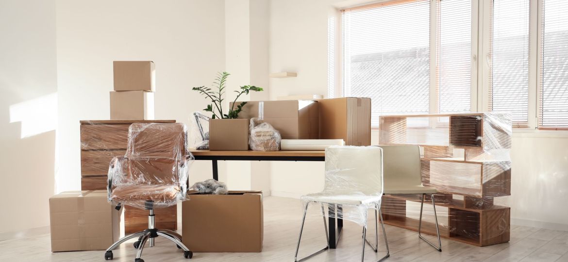 Wrapped,Furniture,With,Stretch,Film,And,Boxes,In,Office,On